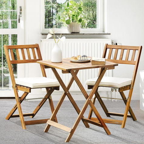 Great price on this french country inspired bistro set. I imagine many coffee breaks on the porch here. Design For Balcony, Bistro Patio Set, Bistro Table Set, Wooden Folding Chairs, Outdoor Restaurant Design, Outdoor Bistro, Minimalist Apartment Style, Outdoor Folding Chairs, Outdoor Bistro Set