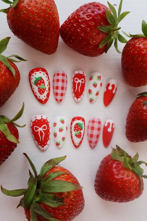 Adorable Strawberries and cream themed nails! It's like a cute little picnic theme as well! These nails you will love! And all hand painted by me. Treat yourself to these cute press on nails! Display nails are in Medium Almond. *Note: Will Not be able to have extra short length nails for this kind of design* Hi and Welcome everyone! I hope you enjoy taking a look at all our nail designs. I sell LUXURY press on nails that are reusable. We use Apres Gel X nail tips and Korean gel products. Just kn Strawberry Themed Nails, Apple Pie Nails, Cute Strawberry Nails, Strawberry Nails Designs, Press On Nails Display, Short Length Nails, Strawberry Shortcake Nails, Picnic Nails, Cute Press On Nails