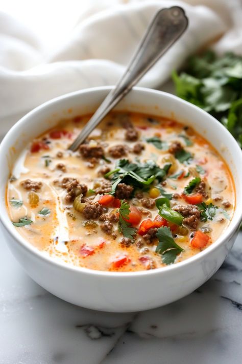 Delicious and Easy Recipe: Creamy Keto Taco Soup with Ground Beef for Diet Lovers #ketodiet #ketorecipes #lowcarb Low Carb Creamy Taco Soup, Ground Beef Keto Soup, Ground Beef Keto Soup Recipes, Keto Recipe With Ground Beef And Cauliflower Rice, Hearty Keto Soup, Soups That Use Ground Beef, Keto Soup Ground Beef, Keto Soup With Ground Beef, Healthy Protein Soup Recipes