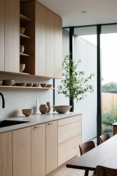 This Japandi kitchen combines clean lines, natural wood, and open shelving to create a functional and stylish space. The mix of Scandinavian simplicity and Japanese minimalism brings warmth and balance, perfect for a modern home. 🌿✨ Looking for ideas? Check out these 10 Japandi kitchen designs for inspiration. Save this pin for later! #JapandiKitchen #MinimalistLiving #KitchenDesign #ModernHome White And Brown Kitchen Dapur Skandinavia Model Dapur Kabinet Dapur Kitchen Island Decor House Design Kitchen Scandinavian Kitchen Japandi Kitchen Desain Pantry Japandi Design Interior Minimalista Interior Design Per La Casa Modern Kitchen Interiors White And Brown Kitchen, Kitchen With Natural Wood, Dapur Skandinavia, Japandi Kitchen Ideas, Kitchen Japandi, Japandi Kitchen Design, Model Dapur, Japandi Kitchen, Kitchen Scandinavian