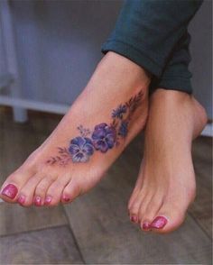 27 Outclass Foot Tattoos Ideas For Women Violet Flower Tattoo, Flower Foot Tattoo, Pansy Tattoo, Violet Flower Tattoos, Tattoo On Foot, Foot Tattoos For Women, Tattoos For Women Flowers, Disney Tattoo, Diy Tattoo