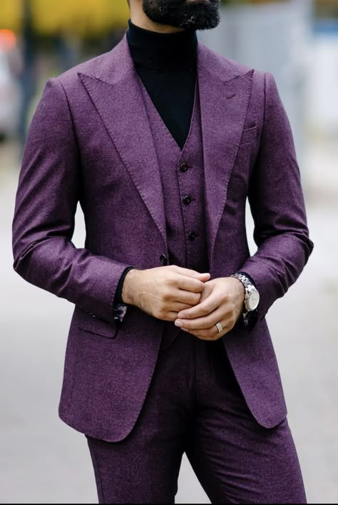 Purple suits for men wedding ideas are numerous. You can make it into a peak lapel suit with a vest, turning it into a stunning three piece suit. The finishing touches could be either a black turtleneck or a white dress shirt! . . Giorgenti, Custom Suit, Bespoke Tailer, Long Island, NYC, New York Black And Purple Suits For Men, Wedding Suits Men Purple, Purple Suit Men Wedding, Purple Suits For Men Wedding Ideas, Plum Suit Men, Deep Purple Suits For Men, Dark Purple 3 Piece Suits For Men, Amethyst Suits For Men, Men’s Purple Suit