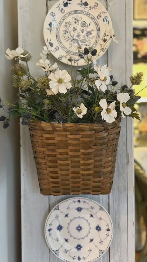 Melody~Old Home Love~Use What You Have~Goodwill Finds | I just love a basket of flowers!🥰 Flowers are from @hobbylobby and @ikeausa. The basket is from @cottonandcrete! #cottonandcrete… | Instagram Wall Flower Basket, Vintage Basket Display, Wall Basket With Flowers, Thrifting Home Decor, Wall Basket Decor Ideas, Wall Pocket Basket Decor, Thrifted Basket Wall, Thrifted Baskets, Hanging Wooven Baskets