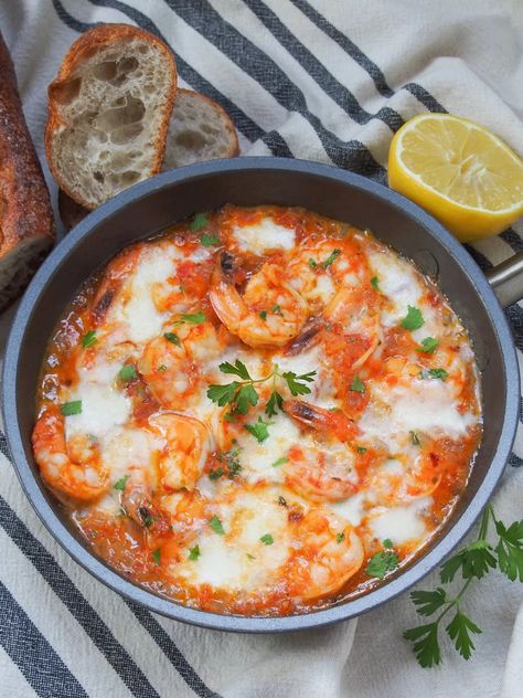 Shrimp saganaki is a delicious Greek dish combining shrimp, a gently spiced tomato sauce and feta cheese. Simple, easy and so good! Strawberry Peach Jam, Shrimp With Tomatoes, Shrimp Saganaki, Tomatoes And Feta, Greek Appetizers, Spinach Rice, Prawn Shrimp, Prawn Recipes, Greek Cooking