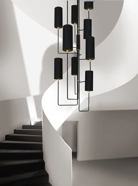 Grande Vortex Chandelier, a custom stairwell chandelier design by Martin Huxford. The arrangement of the asymmetric arms and column shaped upright shades creates a large statement modern staircase light fitting. Made in England. Modern Two Story Foyer Chandelier, Foyer Chandelier 2 Story Minimalist, Large Modern Staircase Chandelier, Stairway Chandelier, Mid Century Modern Staircase Pendant Lights & Chandeliers, Stairwell Chandelier, Staircase Lighting Ideas, Modernist Huge Black Chandelier, Stairwell Lighting