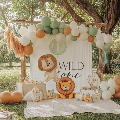 Wild One 1st Birthday Banner, Wild One Backdrop, Watercolor Lion Birthday Party Decoration, Pastel Sage Green Lion Birthday Party Background BACKDROP DETAILS: 🎉 High quality polyester fabric 🎉 Lightweight and easy to steam! 🎉 NOTE: *grommets or holes are NOT included* SIZE OPTIONS: 📏 Small: 36" x 26" ( 3ft x 2.17ft ) 📏 Medium: 60" x 50" ( 5ft x 4.2ft ) 📏 Large: 80" x 68" ( 6.7ft x 5.7ft ) 📏 XLarge: 104" x 88" ( 8.7ft x 7.3ft ) HOW TO HANG: 🎈 Lightweight and super easy to hang on a wall or backdrop stand! 🎈 For Backdrop stand: use clamps, clips, or command strips 🎈 For wall: use pins, tacks, command strips, or tape CARE INSTRUCTIONS: 👕 Machine wash cold on the gentle cycle 👕 Tumble dry low or line dry 👕 No bleach, and do not iron WANT A DIFFERENT COLOR OR STYLE? 📩 Message us! Wild One Banner First Birthdays, Wild One Birthday Backdrop Ideas, Roaring One Birthday, He’s A Wild One Birthday Party, He’s A Wild One Birthday, Wild One Birthday Banner, Zoo Themed First Birthday Party, First Birthday Boy Animal Theme, Wild One Birthday Backdrop