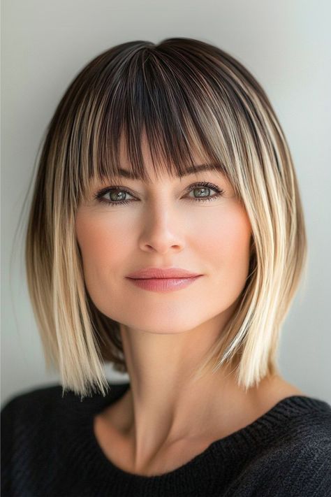 Woman with a sleek, angled bob and blunt bangs styled in a chic and edgy way. Over 40 Long Hairstyles, Long Bob Hairstyles With Bangs, 40 With Bangs, Women Over 40 Hairstyles, Bangs Over 40, Long Hairstyles With Bangs, Medium Length Hairstyles With Bangs, Short Hairstyles With Bangs, 40 Hairstyles