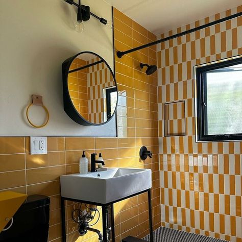 Vibrant color palettes create a look that's as unique as the era that influenced it.  Get the look with Daltile Color Wheel Linear in Mustard and Biscuit. ⁣ Retro Shower Tile, Yellow Sink Bathroom, Mustard Yellow Bathroom, Mustard Bathroom, Mcm Bathroom, Cabin Vibes, Bathroom With Tub, Retro Bathrooms, Barn Decor