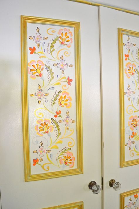 Painting I did inside of the paneling in my closet doors. Warm, colorful floral framed by gold. I sketched out my design directly on the door with pencil first. This is a great weekend DIY project to add interest to a room. For more inspiration, visit my blog at DenaDesigns.com Flowers On Door Painting, Decorated Closet Doors, Creative Door Painting, Closet Door Painting, Painted Closet Doors Aesthetic, Door Frame Painting Ideas, Closet Door Painting Ideas, Painted Door Designs, Cute Door Painting Ideas Bedroom