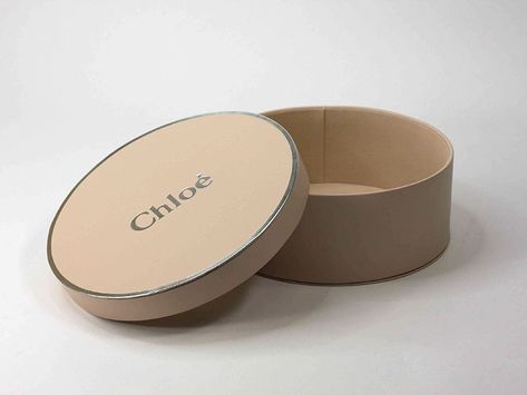 Chloe Special Event Hat Box - Worldwide Axcess Luxury Shopping Box Bag With Round Handle, Chloe Packaging, Hat Packaging Ideas, Round Packaging Design, Round Box Packaging Design, Hat Packaging, Modern Box Bag With Round Handle, Round Box Packaging, Luxury Box-shaped Bag