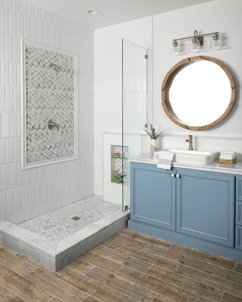 This coastal inspired bathroom features subway tile set in a vertical offset pattern. Changing the orientation from horizontal to vertical brings a fresh feel to the ever classic subway tile. 💙 Vertical Shower Tile, Subway Tile Showers, Subway Tiles Bathroom, Tile Ceramic, Mosaic Wall Tiles, Marble Mosaic Tiles, The Tile Shop, Wood Look Tile, Upstairs Bathrooms