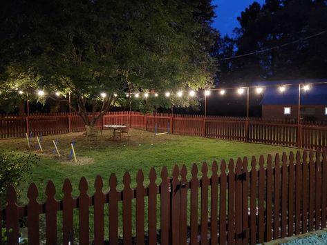 Check out Jeff's backyard lighting system. Here's what he said about it! "Just a big thanks for coming up with an ingenious product. I wanted to light up the dogs fenced area of the back yard. Looked at trying chain link fence poles and top rails and then I saw your ad on the Fox News website and knew I had my answer. Instead of $600, I only had to spend a total of about $200 (including LED lights). I kept making incremental orders because things look so good we’ve extended the project to the pa Christmas Lights On Chain Link Fence, Solar Lights On Chainlink Fence, How To Install Chain Link Fence, How To Make A Chain Link Fence Taller, Chain Link Fence Installation, Fence Lights, Diy Pipe, Fence Lighting, Backyard Lighting