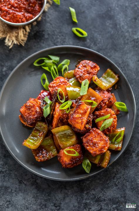 Schezwan Paneer is an Indo Chinese dish where crispy paneer is tossed with a spicy schezwan sauce. It makes a delicious appetizer. Spicy Chinese Sauce, Chili Paneer Recipe, Schezwan Paneer, Crispy Paneer, Paneer Starters, Chili Paneer, Chinese Sauce, Sambhar Recipe, Indian Food Photography