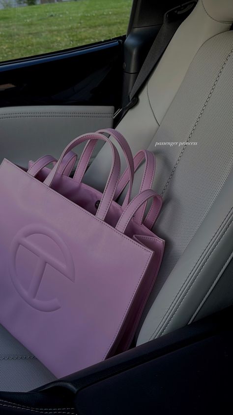 Pink bubblegum telfar bag on car seat, passenger princess Telfer Bag Pink, Pink Telfar Bag Aesthetic, Telfar Pink Bag, Pink Telfar Outfit, Bubblegum Telfar Bag, Telfar Bag Pink, Pink Telfar Bag Outfit, Telfar Bags Medium, Pink Telfar Bag