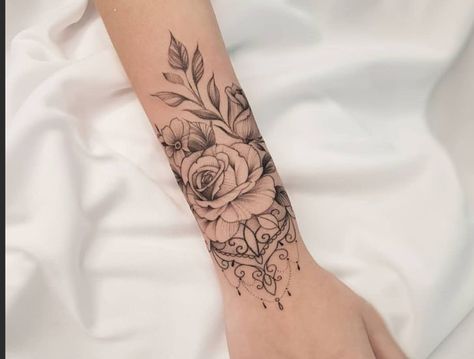 Flower Sleeve Tattoo Ideas, Flower Sleeve Tattoo, Feminine Thigh Tattoos, Tropical Flower Tattoos, Wrap Around Wrist Tattoos, Floral Mandala Tattoo, Unique Wrist Tattoos, Wrap Around Tattoo, Mandala Tattoo Sleeve