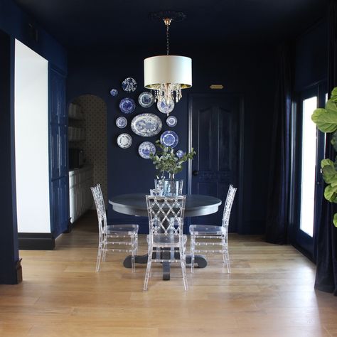 I used to spend little to no time in this space before I did this very bold and brave (for me!) makeover in our breakfast nook. If you’ve been around for a while, you know I LOVE navy blue so I went all out navy in this space. When we bought this home, this space was totally neglected and more of a passageway than a room. When we removed the old kitchen nearby, I knew this space could be the perfect breakfast nook off of our new kitchen! We replaced the floors and painted everything white for a Blue Accent Wall Dining Room, Behr Starless Night, Navy Blue Accent Wall, Accent Wall Dining, Accent Wall Dining Room, Blue Accent Wall, Wall Dining Room, Best Blue Paint Colors, Navy Blue Decor