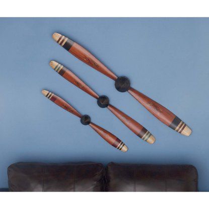 DecMode Airplane Propeller Wall Decor - Set of 3 | Hayneedle Propeller Decor, Plane Propeller, Propeller Wall Decor, Propeller Wall, Red Wall Decor, Airplane Propeller, Industrial Wall Decor, Aviation Decor, Signature Styles