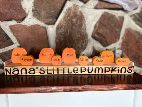 "Hello fall! Homemade personalized pumpkins. Solid wood. Can be personalized any way you like (ex. Grandma's Pumpkins, Nana's Pumpkins, Nonnie's Pumpkins, Abuela's Pumpkins/Calabasas, Gram Gram's Pumpkins, Jones' Pumpkin Patch, etc.) Great family decoration, and also makes great gifts for grandparents! DIMENSIONS Note: All Blocks are approximately 1.5\"-3\" High x .75 Deep. The length of the blocks can vary be age, (smaller pumpkins being the younger children.) or all one size and is dependent u Grandmas Pumpkin Patch Sign, Grandmas Pumpkins, Personalized Pumpkins, Pumpkin Patch Sign, Pumpkin Stand, Pumpkin Stands, Thanksgiving Projects, Wood Pumpkins, Faux Pumpkins