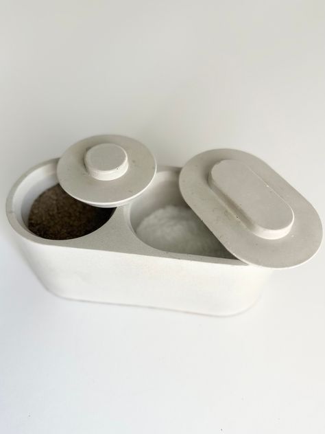 A beautiful, contemporary, and elegantly hand crafted solid concrete salt and pepper vessel. These pieces are crafted from high-quality, durable concrete and come in a sleek, modern design that complements any décor. Weighing in at about 3 pounds this piece is quality, and made to last. Makes a perfect wedding or housewarming gift!  L- 7.75in x H-3in  *corked bottom *comes gift wrapped Salt Cellar with Lid / Salt Box / Salt Pinch Bowl / Salt Pig / Chef Gift / Kitchen Gifts / Salt Pot Salt Cellar With Lid, Pepper Pig, Salt Bowl, Salt Dish, Salt Pig, Pinch Bowls, Salt Box, Pinch Pots, Salt Cellar