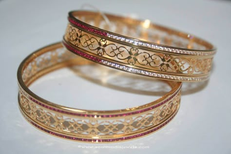 22k gold bangles studded with white and red stones.  For inquiries please contact the seller below. Seller Name : Prakruthi  Vummudi Bangaru Store Contact No : +91-44-4350-4460/+91-98840-72021 Website      : http://vbprakruthi.com/ Email         : info@vbprakruthi.com More CollectionsGold Simple Daily Wear Bangles from PrakurthiGold Ruby Emerald Bangle from PrakruthiGold Designer KanganGold Pearl Ruby DropsSimple Gold Jhumki From Prakruthi50 Plain Gold Bangles, 22k Gold Bangles, Gold Bangles Indian, Gold Bangles For Women, Gold Bangle Set, Antique Gold Jewelry Indian, Bangles Gold, Red Stones, Real Gold Jewelry