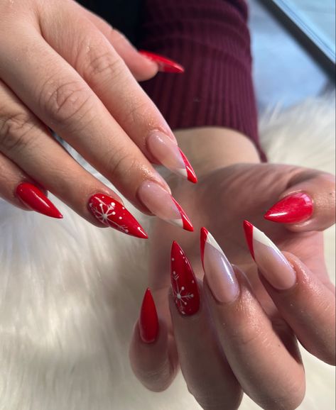 Red Christmas nails with snowflakes Red French With Rhinestones, Red Snowflakes Nails, Red Nails With White Snowflakes, Holiday Almond Nails Winter, Red Nails Snowflake, Red Nails With Snowflakes, Red Christmas Almond Nails, Bright Red Christmas Nails, Red Nails With Snowflake Design