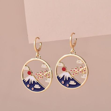 Japanese style folklore inspired enamel earrings Materials Zinc alloy & Enamel Approximate measurements 10mm hoop with hinged fastening 4.3 cm in length 2.8 cm diameter Pretty enamel gold tone earrings inspired by Japanese folklore & culture This design is inspired by Mount Fuji Mount Fuji was said in traditional Japanese folklore to have been created in a day witnessed by a woodsman called Visu Brand new - sent in reusable mini plastic box to protect the earrings. If you require a backing card & cellophane sleeve for a gift please leave a note at checkout so we can make sure you have those Thank you for your interest. Please visit our store Kawaii Rainbows for lots more quality Japan & Korea inspired & LGBTQ gifts & jewellery Terms * All orders are dispatched within one working day * The Japanese Earrings, Japan Gifts, Japanese Jewelry, Jewelry Traditional, Japanese Folklore, Mount Fuji, Backing Card, Enamel Earrings, Gold Enamel