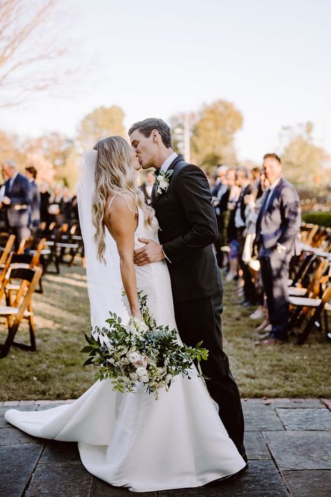 End Of Aisle Kiss Photo, End Of Aisle Wedding Photo, Bride Coming Down The Aisle, Wedding Aisle Kiss Photo, Bride And Groom First Kiss, Aisle Kiss Wedding, Bride And Groom Same Height, End Of Aisle Kiss, Mid Aisle Kiss Wedding