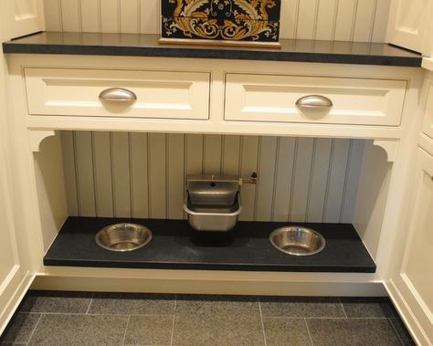 Creating a safe, comfortable space for Bruiser doesn’t have to mean your house has to literally go to the dogs. Here are eight options for c... Dog Station, Dog Food Station, Traditional Laundry Room, Red Cabin, Food Storage Cabinet, Pet Station, Kennel Ideas, Pet Room, Pet Feeding Station