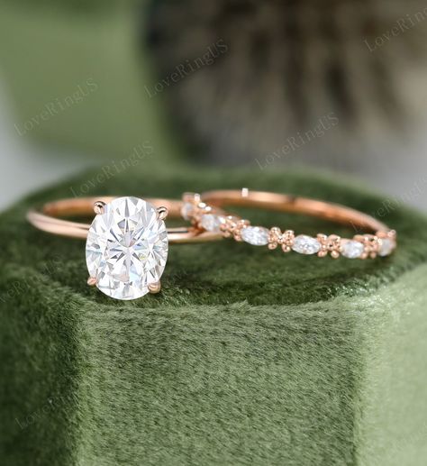 Oval moissanite Engagement Ring Set Unique Vintage Rose Gold Engagement Ring women Unique Diamond Bridal ring Anniversary gift Promise ring ITEM DESCRIPTION: Center stone: Oval cut Moissanite Size: 7*9mm Shaped: Oval shaped Side stone: 0.065ct moissanite Color/Clarity: G-H,SI1-VS Or moissanite :0.065ct 0.9mm Round cut Width of band: 1.5mm Thickness of band: 1.2mm Total weight: 2.2g Wedding band Natural Diamonds:0.18ct Stone size:a 1.5*3mm Marquise cut CLARITY: SI/VS COLOR: G/H Or moissanite 0.18 Dainty Oval Wedding Ring Set, Rings Engagement Moissanite, Rose Gold Oval Wedding Ring Set, Engagement Rings Solitaire Oval, Oval Dainty Engagement Ring, Oval Moissanite Engagement Ring Set, Mossianite Engagement Rings Oval, Unique Mossianite Engagement Rings, Oval Shaped Wedding Rings