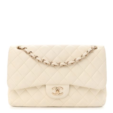 This is an authentic CHANEL Caviar Quilted Jumbo Double Flap in White. This stunning large flap bag is finely crafted of diamond quilted luxurious caviarleather in white. The handbag features gold chain-link shoulder straps threaded with leather, a facing flap, and a Chanel CC turn lock. This opens to an inner flap and a matching leather interior with patch pockets. White Luxury Designer Bag, Winter Purses Handbags, White Chanel Bag, Chanel Quilted Bag, Chanel Double Flap, Chanel Jumbo, Chanel Flap Bag, Summer Handbags, Popular Handbags