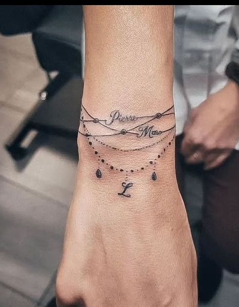 Bracelet Tattoos With Names, Bracelet Tattoos For Women, Bracelet Tattoos, Wrist Bracelet Tattoo, Tato Minimal, Tiny Wrist Tattoos, Ankle Bracelet Tattoo, Cool Wrist Tattoos, Ankle Tattoos For Women