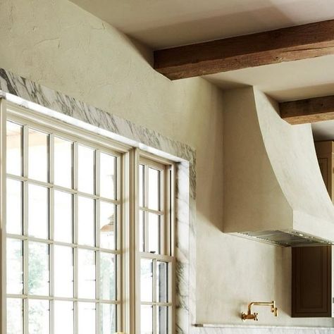 Light and Dwell on Instagram: "Say hello to the kitchen, heart of the home, scullery, cooker or in most cases, the *mess. The importance of quality natural materials shines through in our #englishcolonialproject, especially here in the kitchen. The marble wrapped around the window gives it an elevated look, paired with the textured plaster on the walls + hood is the perfect juxtaposition. This English-inspired gathering space is a breath of fresh air and effortlessly encourages an organic way of Marble Around Windows, Marble Window Casing, Marble Window Trim, Plaster Walls Kitchen, Plaster Range Hood Ideas, Plaster Range Hood, Monterey House, Low Cortisol, Plaster Hood