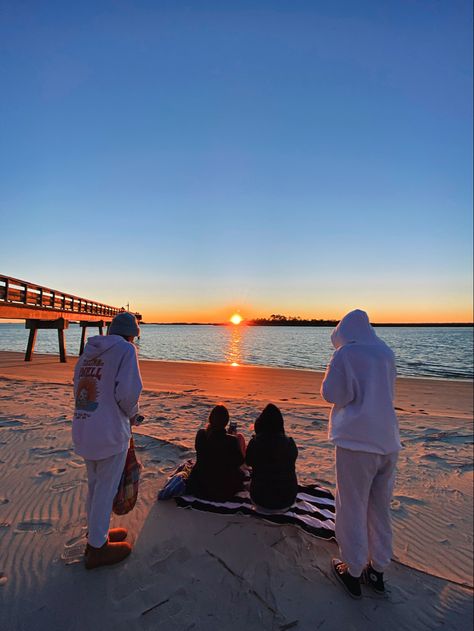 Beach, Tybee Island, sunset, Georgia, picnic, college, friends, hoodies at the beach Tybee Island Georgia Aesthetic, Senior Week Beach, Savannah Georgia Beach, Friends At Sunset, Georgia Beaches, Trip Friends, Senior Sunrise, Tybee Island Georgia, Beach Week