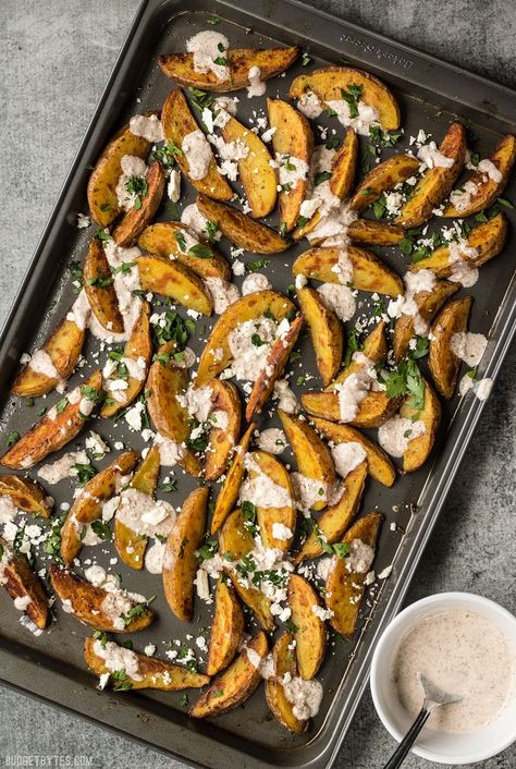 These simple Roasted Potato Wedges are the perfect vehicle for this creamy, garlicky shawarma sauce and crumbled feta. #garlic #potatoes #sidedish #carbs #easyrecipes #recipe Shawarma Sauce, Easy Roasted Potatoes, Roasted Potato Wedges, Roasted Potato, Creamy Mushroom Pasta, Budget Bytes, Potato Wedges, Frugal Meals, Creamy Garlic