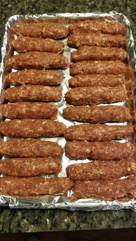 Romanian Mici (Mititei) - Food & Wine Chickie Insider Romanian Mici Recipe, Mici Romanian Food, Mici Recipe, Mititei Recipe, Romanian Food Recipes, Romanian Sausage, Romanian Food Traditional, Diy Sausage, Pork Goulash