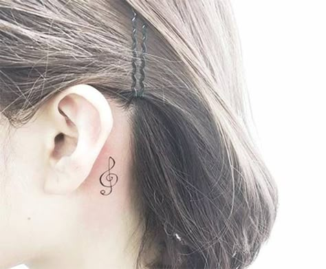 G clef tattoo behind the left ear. Treble Clef Tattoo Behind Ear, G Clef Tattoo, Treble Clef Tattoos, Left Tattoo, Clef Tattoo, Small Music Tattoos, Tattoo Behind The Ear, Hexagon Tattoo, Small Tattoo Placement