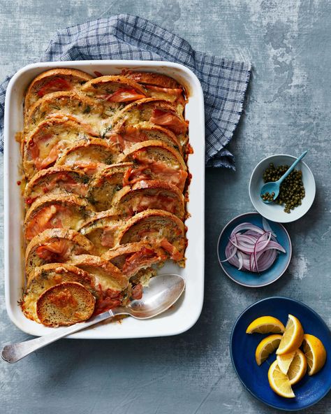 Jewish-Deli Strata Recipe | Martha Stewart Living — Garnishes like capers, red onion, and lemon add freshness to this bagels-and-lox-inspired strata. Brunch On A Budget, Simple Starters, Recipe Development, Strata Recipes, Martha Stewart Christmas, Jewish Deli, Hosting Brunch, Tech Ideas, Food Tech