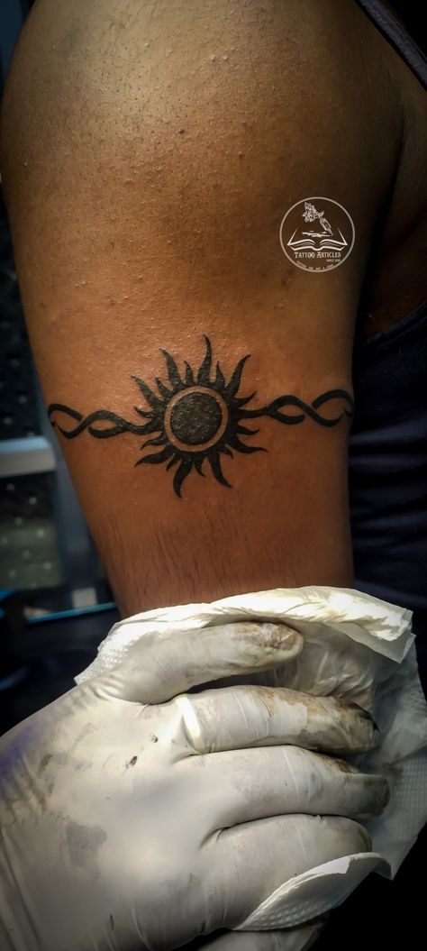 Sun with tribal band Tattoo Sun Band Tattoo, Bicep Band Tattoo Men, Trible Tattoos, Wrap Around Tattoo, Birthday Tattoo, Band Tattoo Designs, Tasteful Tattoos, Sun Tattoos, Arm Band Tattoo