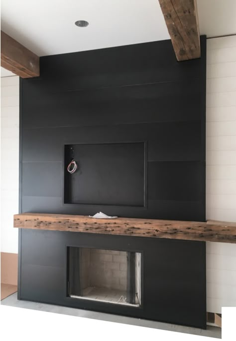 Metal And Wood Fireplace Surround, Modern Industrial Fireplace Ideas, Black Slate Fireplace Wall, Black Stone Veneer Fireplace, Dark Grey Tile Fireplace, Black Wood Panel Fireplace Wall, Dark Tile Fireplace, Black Stone Fireplace Ideas, Black Tile Fireplace Surround