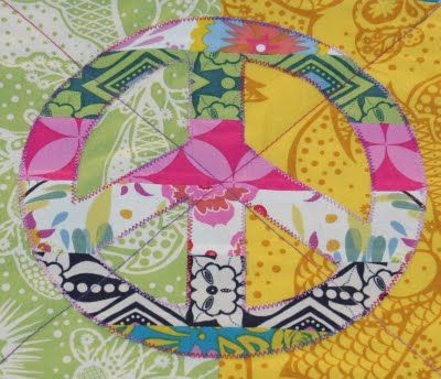 I want to use this pieced peace sign applique idea and add it to Alana's store bought quilt/comforter. It'll personalize it just perfectly. Peace Sign Pillow, Play Mat Quilt, Peace Sign Applique, Quilt Tattoo, Peace Sign Art Hippie, Appliqué Ideas, Quilt Stories, Hippie Bedroom, Finished Quilts