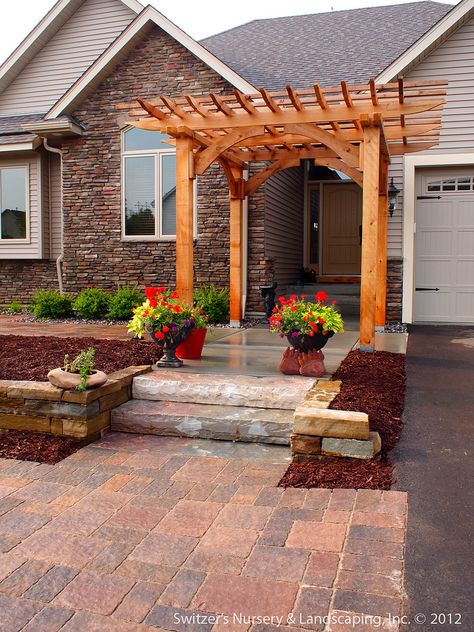 Custom Designed & Installed Natural Cedar Arbor at Front Entrance of Home Chilton Natural Stone Steps & Savannah Stone Walls Borgert Strassen® Bavaria Tumbled Paver Patio - North Shore Color Blend  Project located in Lakeville, Minnesota  ---------------------------------------------------------------- ~~ Patios - Pergolas - Outdoor Living ~~  ---------------------------------------------------------------- The Art of Landscape Design - Providing Exceptional Quality & Uniquely Cre... Front Door Pergola, Front Porch Pergola, Cedar Arbor, Door Pergola, Pergola Outdoor Living, Pergola Diy, Cedar Pergola, Pergola Ideas, Pergola Attached To House