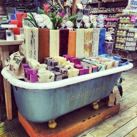 Using an old bathtub to display soap. Soaptopia.                                                                                                                                                     More Retail Store Layout, Gift Shop Displays, Old Bathtub, Soap Display, Soap Making Kits, Craft Fair Displays, Store Layout, Soap Shop, Booth Display