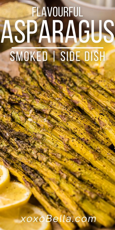 Try this flavorful smoked asparagus on a Traeger grill or pellet smoker and you're sure to be impressed. Asparagus is always delicious and it's a versatile vegetable, suiting anything from stir-fries to soups and side dishes. The following smoked vegetable recipe is simple to make and boasts a buttery, lemon flavour as well as the wonderful smokiness. This asparagus side dish is always a BBQ hit! You can't beat this flavourful smoked asparagus side dish made on a smoker. Asparagus On The Smoker, Smoker Recipes Vegetables, Smoked Asparagus In Smoker, Smoker Vegetable Recipes, Smoked Vegetables In Smoker, Smoker Sides Dishes, Smoked Asparagus, Pit Boss Pellet Grill Recipes, Asparagus Side