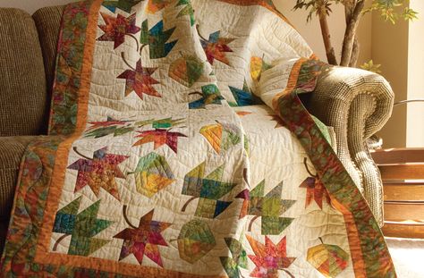 Nature's fiery fall colors featured in this autumn quilt from the book Eye-Catching Quilts. Leaves Quilt Pattern, Canada Quilt, Novelty Quilts, Leaf Quilts, Autumn Quilts, Leaves Quilt, Leaf Quilt, Fall Quilt Patterns, Tree Quilts