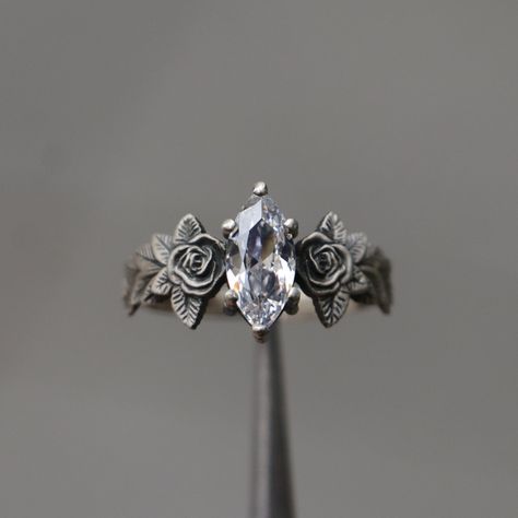 Moissanite Rose Leaf 925 Silver Marquise Ring, Flower Moissanite Ring, Colorless Stone Silver Ring, Alternative Moissanite Engagement Ring -->Ring details: - Theme: Romantic Wedding, Engagement, Daily, Frienship - Comfortable Band - Center Stone : Onyx - Ruby - Amethyst - Citrine - Moissanite - Emerald - Carat: 5x10 mm --->Materials: - 925 Silver or Gold Plated Silver --->The ring size on the model is 6 US. --->Items are shown larger in pictures to show detail - please note the dimensions. This item is in my shop are handcrafted made to order. --->Accessories: - beautiful jewelry boxes, and some of little gifts. --->Guaranteed Purchase: - 14 Day Refund Guarantee; - Excellent Customer Service; - Free Transportation and insurance to All Parts Of The World; - Free Gift Box&Packing --->Please Rose Leaf, Cute Engagement Rings, Marquise Ring, Ring Flower, Dream Engagement Rings, Silver Engagement Rings, Pretty Rings, Fantasy Jewelry, Moissanite Ring