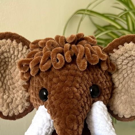 @inthecrochetcupboard on Instagram: "Mammoth 🦣 

I absolutely loved making this! 

Pattern by @crochetgrove 💕

#crochet #crochetersofinstagram #crochetinspiration #crocheted #crochetlover #crochetpattern #amigurumi #explore #explorepage #handmade #memade #plushie #jellycat #mammoth #iceage" Velvet Crochet Stuffed Animal, Crochet Jellycat, Huge Crochet Plushies, Crochet Mammoth, Crochet Animals Velvet Yarn, Crochet Anteater, Crocheted Things, Crochet Collection, Market Stall