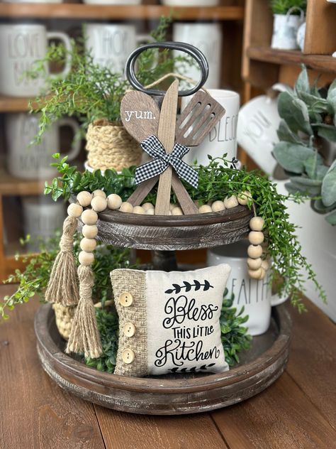 Traditional and modern farmhouse style tiered tray decor for the kitchen. Neutral Tiered Tray Decor, Tired Trays, Florida Decor, Farmhouse Living Room Furniture, Antique Booth, Coffee Bars In Kitchen, Coffee Bars, Kitchen Counter Decor, Tray Ideas