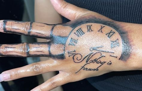 Hand tattoos Clock Hand Tattoos For Women, Simply Hand Tattoos, Nothing Forever Tattoo Hand, Nothing Lasts Forever Tattoo Hand, Manifest Hand Tattoo, Hand Tattoos With Names, Name Hand Tattoos, Clock Hand Tattoo, Top Of Hand Tattoos For Women