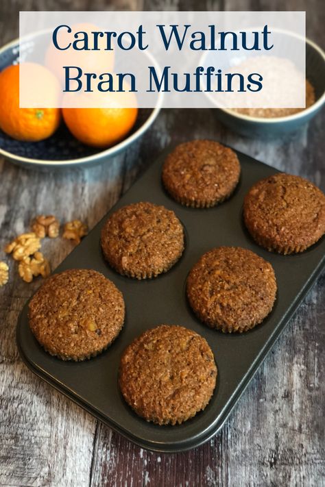 Six Carrot Walnut Bran Muffins in a muffin tin, flanked by two bowls, one containing three oranges and one containing bran Healthy Bran Muffin Recipe, Carrot Bran Muffins, Bran Muffin Recipe, Bran Muffins Healthy, Carrot And Walnut Cake, Toast Recipe Breakfast, Bran Muffin, Bran Muffin Recipes, Walnut Muffins