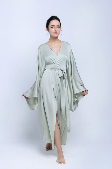 We are happy to expand your favourite silk collection. Adding silk kimonos this season. Made of blend silk. This outfit is not a substitute in the wardrobe of any woman. Included with the kimono is a belt that will emphasise the waistline, giving a refined silhouette. Robe For Women, Silk Kimono Robe, Silk Robe, Bridesmaid Robes, Womens Robes, Mint Color, Silk Kimono, Long Style, Kimonos